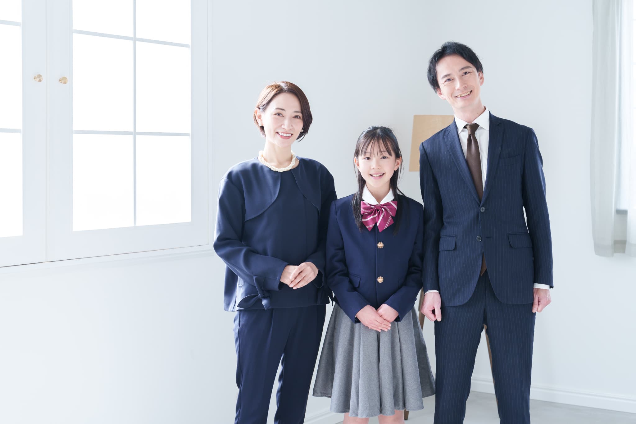 中学生と両親